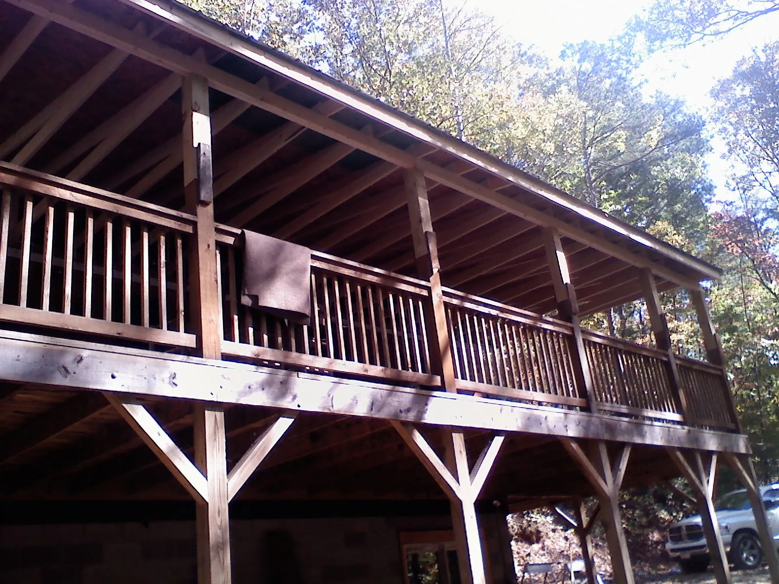 Timber framing under a new elevated porch and deck — Roof Leak Repair in Amarillo by Roofing Brothers
